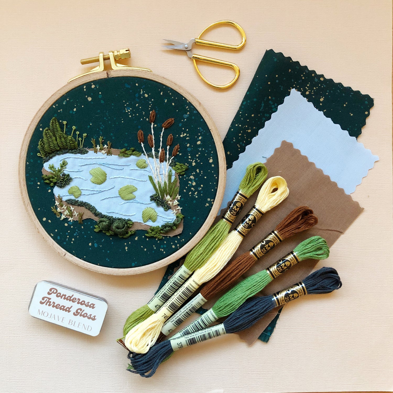Completed design from 3D Lily Pad Pond advanced embroidery kit contents and materials.