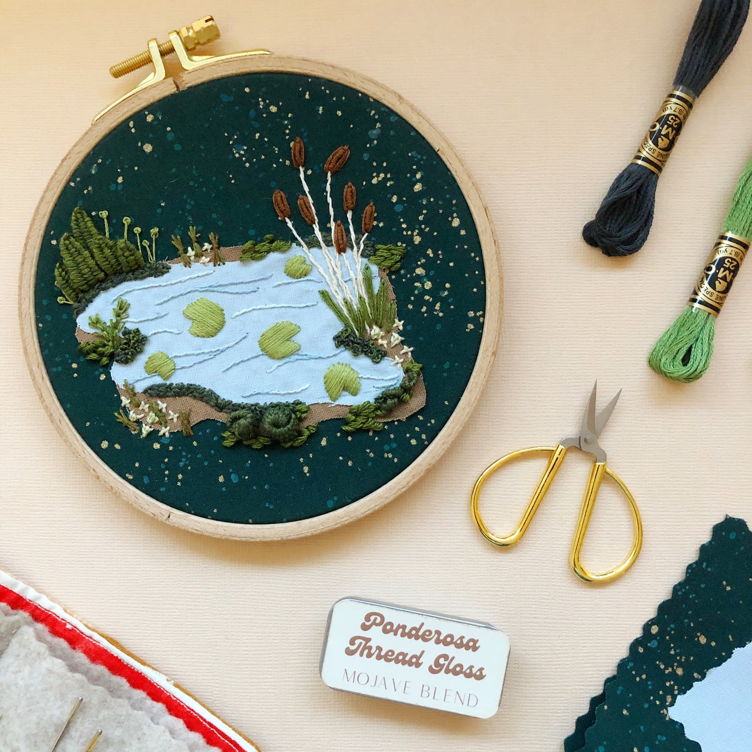 Completed view of 3D Lily Pad Pond advanced embroidery kit finished design and materials.